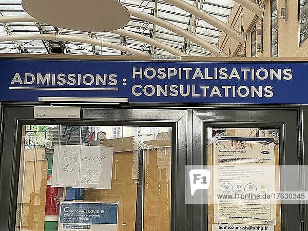 Signage of the admissions department of the Saint-Louis hospital in Paris.