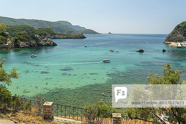 Greece  Corfu island  Paleokastrites  Boats in turquoise bay