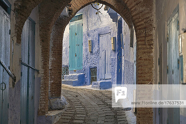 Morocco  Chefchaouen  Narrow alley and traditional blue houses