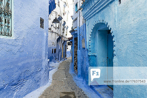 Morocco  Chefchaouen  Narrow alley and traditional blue houses