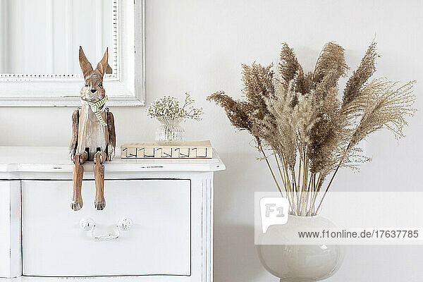 Wooden bunny and pampas grass home decor