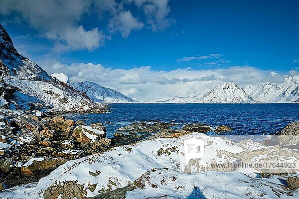 Lofoten islands and Norwegian sea in winter with snow covered mountains. Lofoten islands  Norway