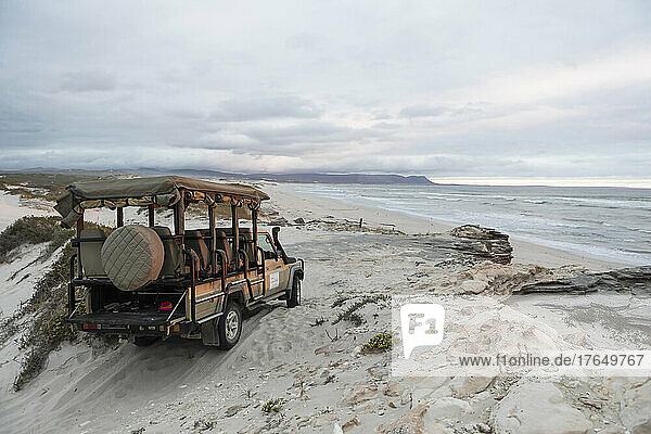 South Africa  Western Cape  Sopies Klip  Safari vehicle on beach