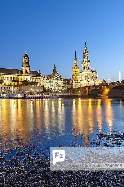 Germany  Saxony  Dresden  Elbe river at dusk with Dresden Castle and cathedral in background
