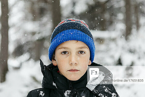 Boy wearing knit hat in winter