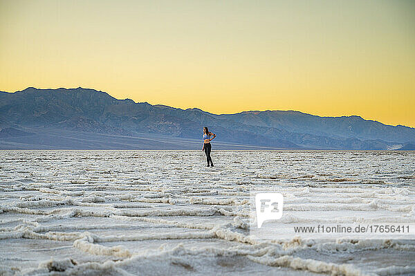 Female posing at Badwater in Death Valley National Park