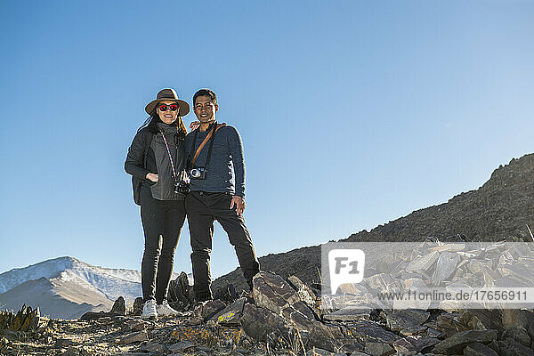 couple posing for camera at remote location in Mongolia