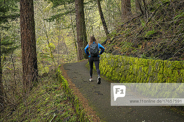 Female hiking on a trail in the Columbia River Gorge