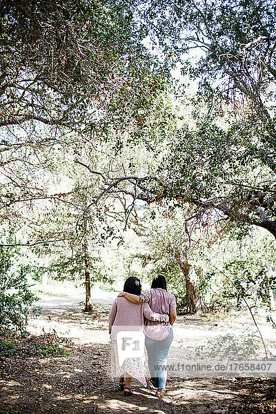 Mother & Daughter Walking Together on Trail in San Diego