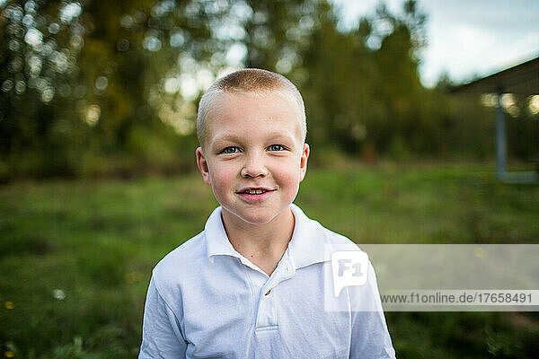 Portrait of young handsome boy outdoors.