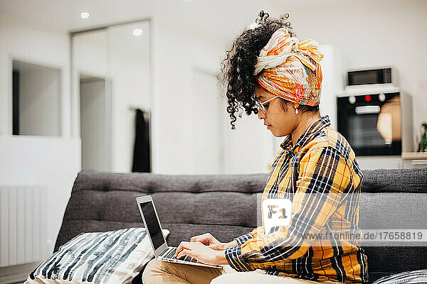 businesswoman working from home with her laptop