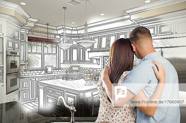 Junges militärisches Paar  das in eine maßgeschneiderte Küche schaut und eine Zeichnungskombination entwirft