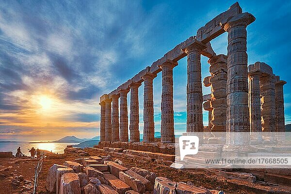 Greece Cape Sounio  Ruins of an ancient temple of Poseidon  Greek god of the sea  on sunset  Shot of temple ruins on sunset  Tourist landmark of Attica  Sounion  Greece  Europe