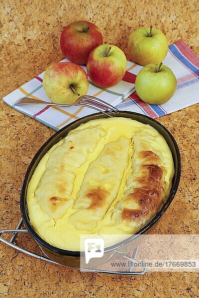 Swabian cuisine  Rutesheim raw strudel  Rutesheim national dish  poor people's food  traditional dish from the oven  filled pasta dough with apples and sour cream  sweet main dish  sweet strudel au gratin  casserole dish  fork  food photography  studio  Germany  Europe