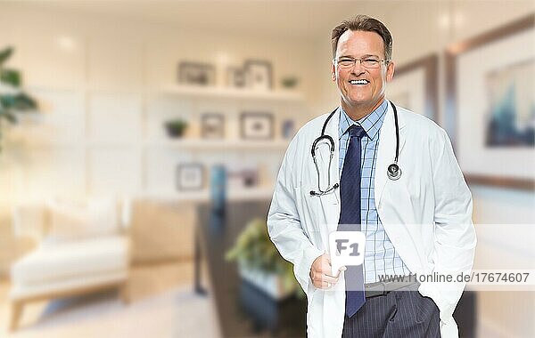 Handsome doctor or nurse standing in his office