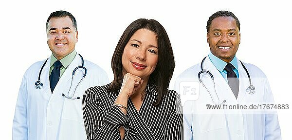 Two mixed-race doctors behind hispanic woman isolated on a white background