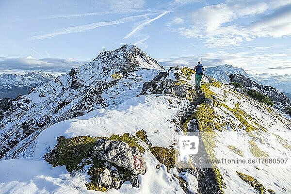 Young female hiker on hiking trail to Kramerspitz  back summit  Bavaria  Germany  Europe