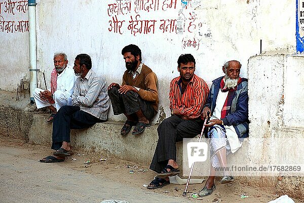 Rajasthan  Mandawa  street scene in small town centre  men meeting  North India  India  North India  India  Asia