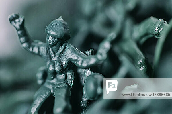 Close-up of green plastic toy soldier