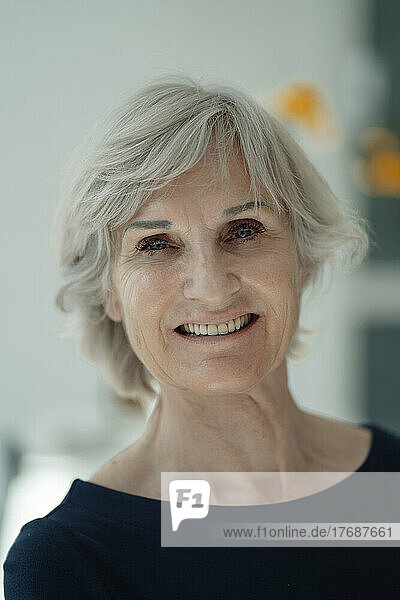 Happy senior woman with gray hair