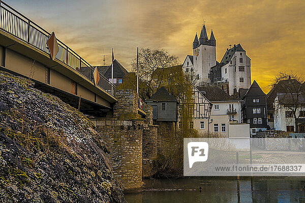 Germany  Rhineland-Palatinate  Diez  Bridge stretching over river Lahn at dusk with Diez Castle in background