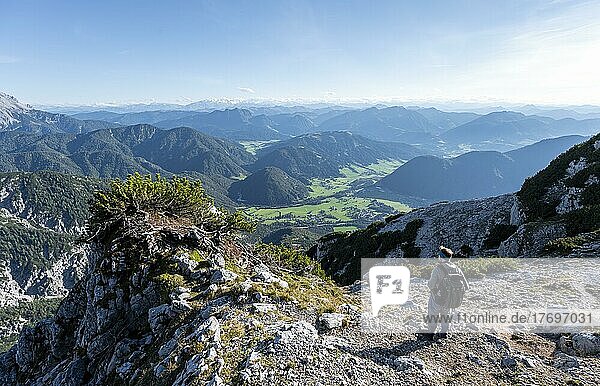 Hiker on hiking trail  view over mountain landscape  Nuaracher Höhenweg  Loferer Steinberge  Tyrol  Austria  Europe