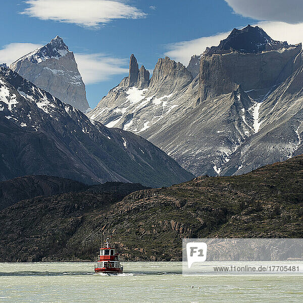 A Boat On Grey Lake  Torres Del Paine National Park; Torres Del Paine  Magallanes And Antartica Chilena Region  Chile