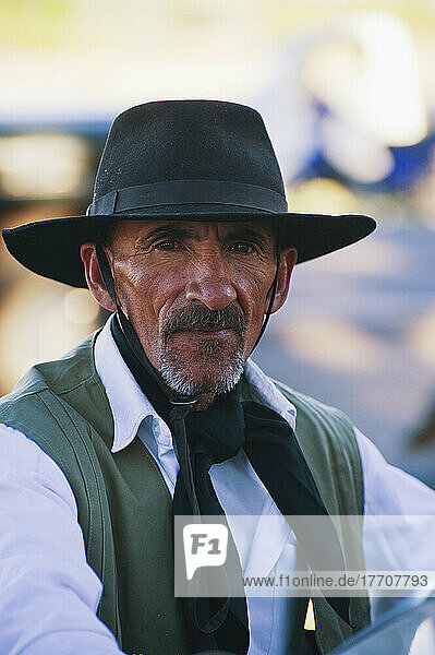 Portrait Of A Man Wearing A Brimmed Hat And Scarf; Malargue  Argentina