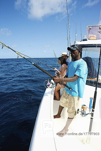 Fishing Off The Deck Of A Boat In The Indian Ocean; Vamizi Island  Mozambique