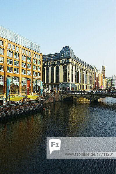 A Road Bridge Crossing The River And Buildings Along The River; Hamburg  Germany