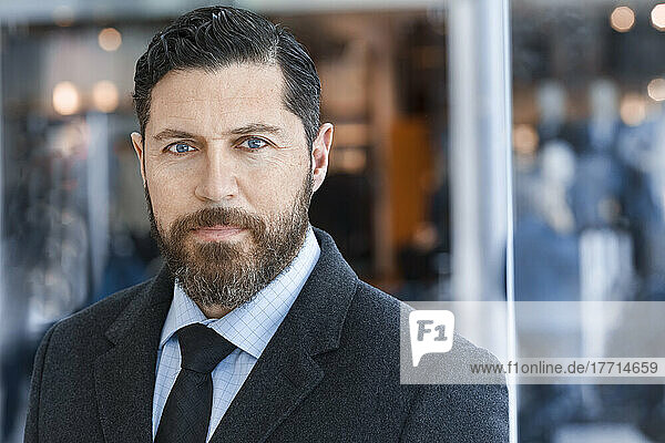 Portrait of bearded businessman wearing suit; Toronto  Ontario  Canada