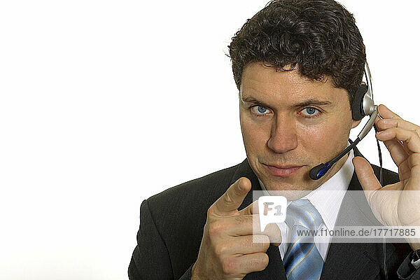 Artist's Choice: Businessman Pointing With Headset