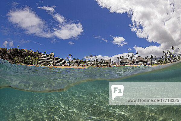 An ocean level split view of the north end of the world famous Ka'anapali Beach and the Sheraton Hotel; Maui  Hawaii  United States of America