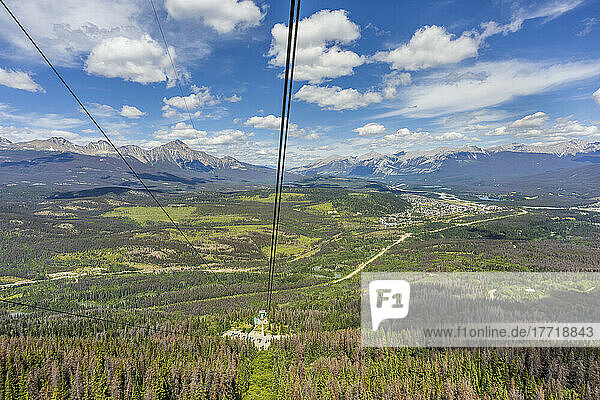 Aerial view of Jasper and the Skytram lower station from a Skytram cabin in Jasper National Park; Jasper  Alberta  Canada