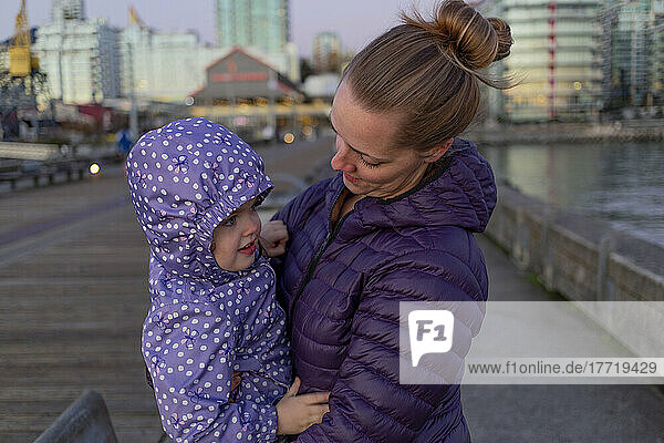 Mother and young daughter at Lonsdale Quay; North Vancouver  British Columbia  Canada