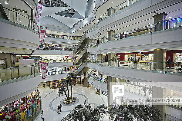 Interior of Shanghai Plaza  with stores lining the multi-level corridors  near Xintiandi; Shanghai  China