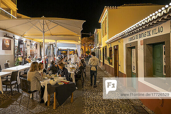 Tourists dining in the Old Town at night  Funchal  Madeira  Portugal  Atlantic  Europe
