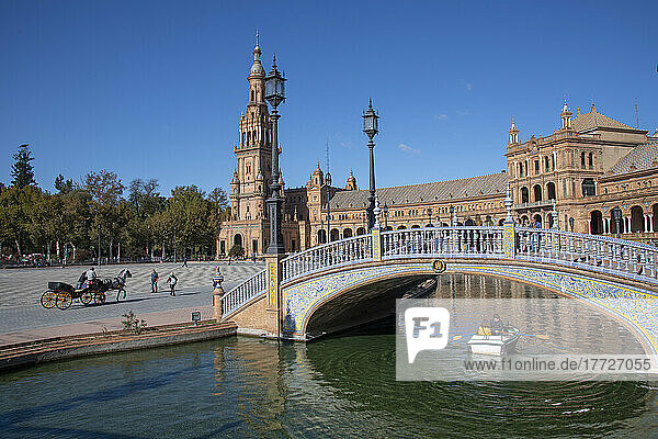 A horse with cart and rowboat touring Plaza de Espana  Seville  Andalusia  Spain  Europe