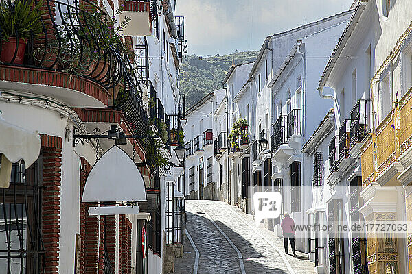 Out for a stroll in Zahara de la Sierra  one of the whitewashed towns of Andalusia  Spain  Europe