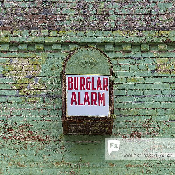 Old burglar alarm ona building facade