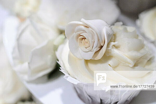 Close up of a wedding cupcake decoration  a suger rose.
