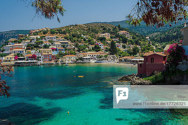 Sunny view of traditional Asos Village with low-rise houses by the sea in Kefalonia village  Kefalonia  Ionian Islands  Greek Islands  Greece  Europe