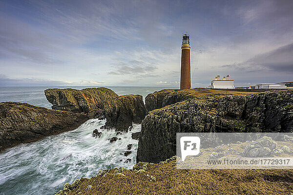 Butt of Lewis Lighthouse with rugged coastline  Isle of Lewis  Outer Hebrides  Scotland  United Kingdom  Europe