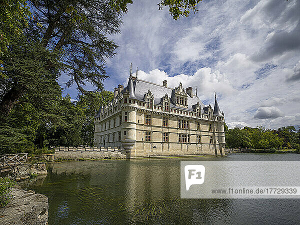 Castle of Azay-le-Rideau reflected in lake in a sunny day with clouds  UNESCO World Heritage Site  Azay-le-Rideau  Indre et Loire  Centre-Val de Loire  France  Europe