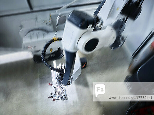 Blurred motion of modern manufacturing machinery in industry