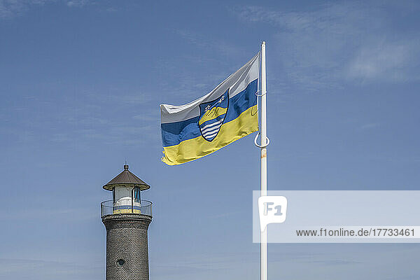 Germany  Lower Saxony  Juist  Flagpole in front of Memmertfeuer lighthouse