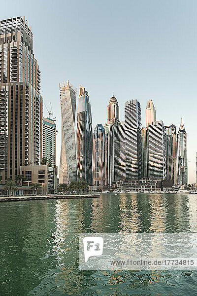 United Arab Emirates  Dubai  Dubai Marina with tall downtown skyscrapers in background