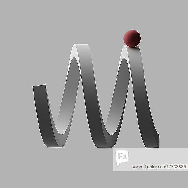 Three dimensional render of red sphere balancing on letter M