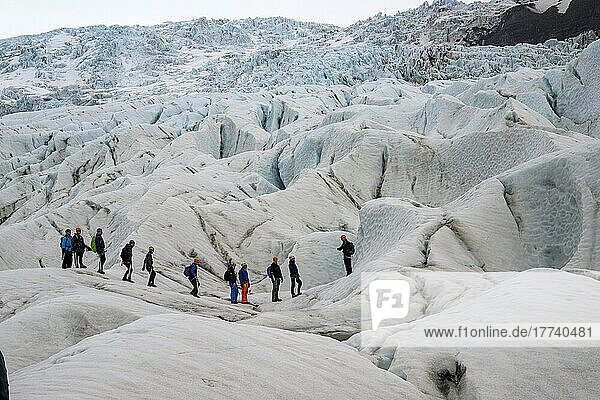 Hiking group at the glacier  Skaftafell NP  Iceland  Europe