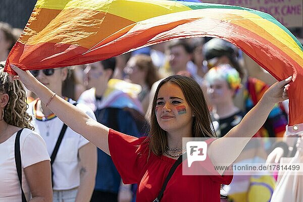 Woman with rainbow flag at the CSD Parade Cologne  North Rhine-Westphalia  Germany  Europe